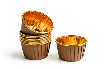 Paper molds for baking cupcakes and muffins on a white background.