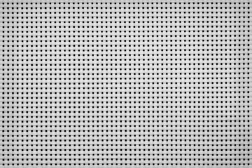 perforated texture. white mesh background from threads.