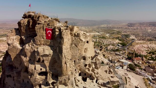 Flying near uchisar castle in cappadocia region, turkey