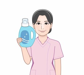 洗濯洗剤を持った女性