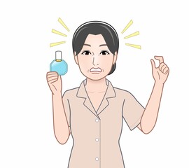 目薬を持った女性