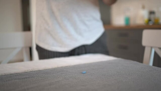 A young man takes a prep in a pill. HIV prevention concept. SIDA prevention concept.