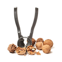nutcracker with walnut close up part isolated on white background