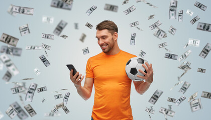 sport, leisure games and online betting concept - happy smiling man or football fan with smartphone...