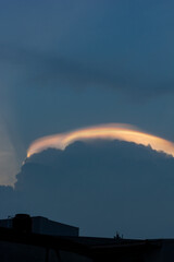 Iridescent clouds rare phenomenon in Bandung sky, Indonesia. lightning in the clouds, rainbow in...