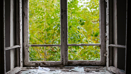 Smashed glass Window with old wooden frame. old window. finely broken glass. old house, retro....