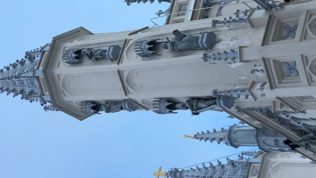 Spire of the Church in the medieval Gothic style. Gothic chapel. Top of the towers