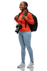 people, profession and photography concept - happy smiling woman photographer with digital camera and backpack over white background