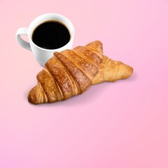 Fresh baked breakfast croissants with cup hot espresso coffee