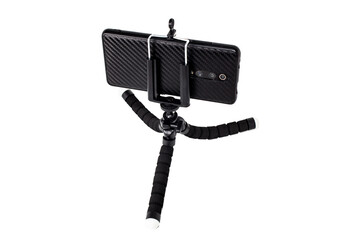 Black tripod for with installed smartphone. Isolation on white.