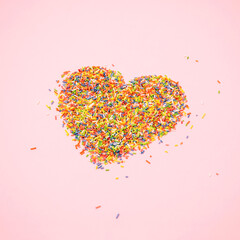 Heart made of colorful  chocolate confetti. Valentine's day concept.