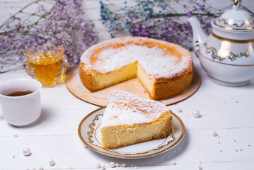 a piece of cut cake on a white background