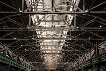 The roof of a large building and the premises of the production workshop.