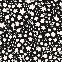 Fototapeta na wymiar Black and white ditsy daisy millefleurs seamless repeat pattern. Random placed, doodled vector flowers with leaves and dots all over print.