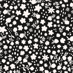 Black and white ditsy daisy millefleurs seamless repeat pattern. Random placed, doodled vector flowers with leaves and dots all over print.
