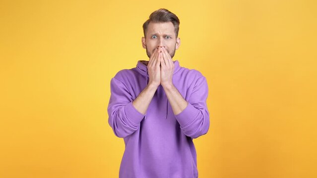 Amazed guy impressed horrible novelty isolated shine color background