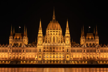 Obraz na płótnie Canvas Hungarian parliament building from across the Danube river at night Budapest Hungary Europe