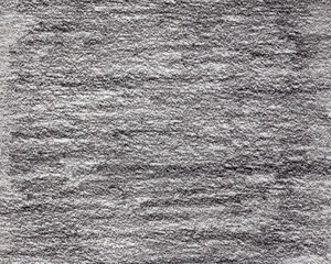 Black charcoal pencil strokes on art paper