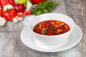 Beef stew with potatoes and carrots in tomato sauce in a bowl. Slow cooking concept.