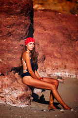 woman in bikini in milos at the beach