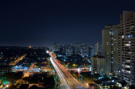 S&atilde;o Paulo, Brazil by night. Lights of cars and buildings on Vereador Jose Diniz avenue at night.
