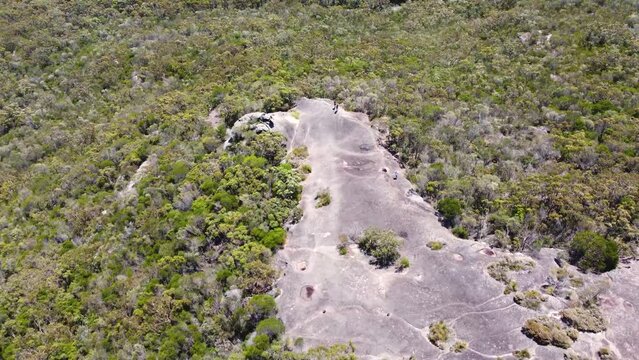 Aerial drone shot of Patonga Beach Elephant Rock formation bushland Brisbane Water National Park Central Coast NSW Australia 4K