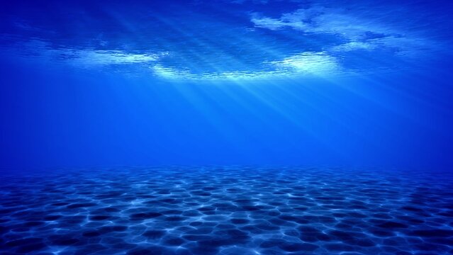 Underwater sun rays in the ocean.
