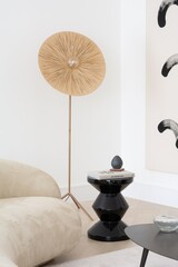 living room interior with table floor lamp painting art and sofa