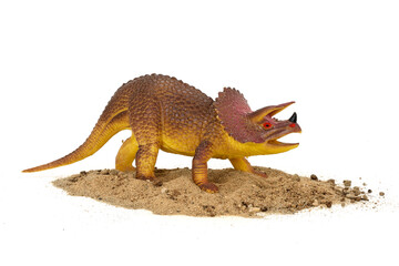 Plastic toy dinosaur isolated on white background.