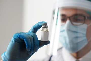 Professional medical doctor in hospital office. Portrait of young and confident physician. Medical...