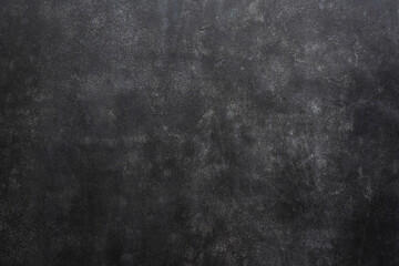 Obraz na płótnie Canvas Black concrete wall texture background great for design projects, web banners. Copy space for text or elements