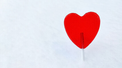 Sweet heart. Heart in the snow. Declaration of love. Postcard romance.