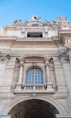 Low angle view of exterior of Saint Peter's Basilica. 