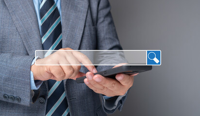 Businessman using a smartphone for searching information on the internet, searching browsing...