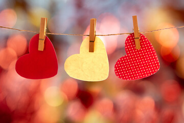 red hearts hanging on a string
