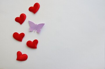 red hearts on a white background with a place to record, minimalism