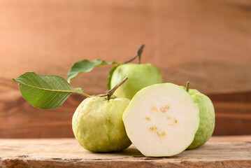 Fresh organic guava fruit on wooden background, Tropical fruit