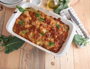 Kohlrabi gratin cooked with vegetable, white sauce and cheese topping