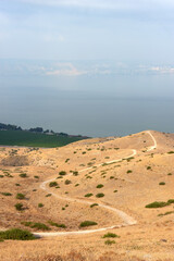 Shore of Lake Kinneret, the slopes of the Golan Heights in Israel