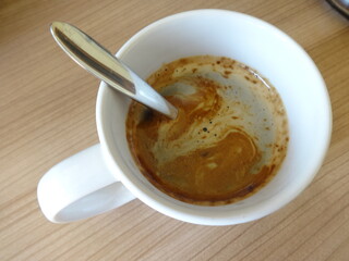 Hot Coffee in a Mug with Spoon