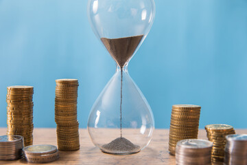 Hourglass with coins