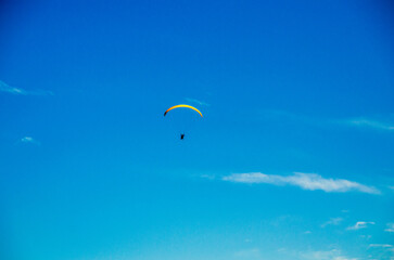 Paragliding in the blue sky, Aracaju, Sergipe, Brazil February 8th, 2016