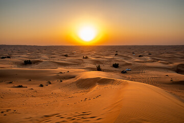 Sunset in the desert dunes of Dubai