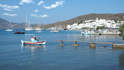 Fototapeta na wymiar Well protected from winds picturesque main port of Milos island, Cyclades, Greece