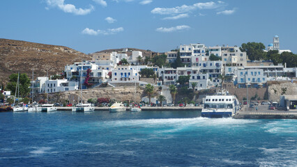 Fototapeta na wymiar Well protected from winds picturesque main port of Milos island, Cyclades, Greece