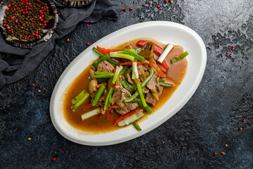 Fried beef with vegetables and pepper Chinese cuisine