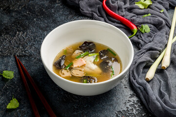 soup miso with salmon on white bowl with rice, Chinese cuisine