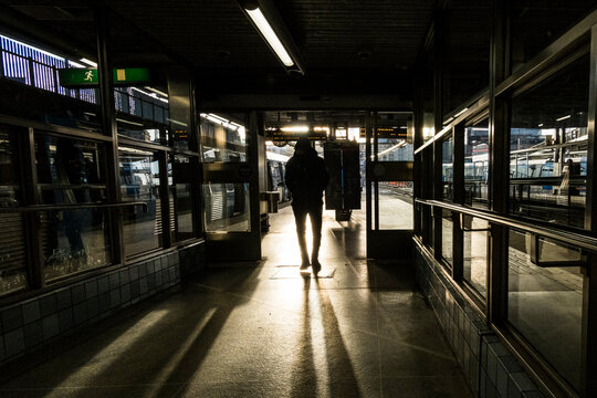 Stockholm, Sweden People standing in the hard winter sun at the Gamla Stan or Old Town tunnelbana or subway stop outdoors.