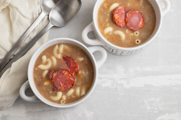 typical portuguese soup with smoked sausages and meat