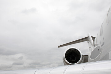 High detailed close up view white private business jet engine